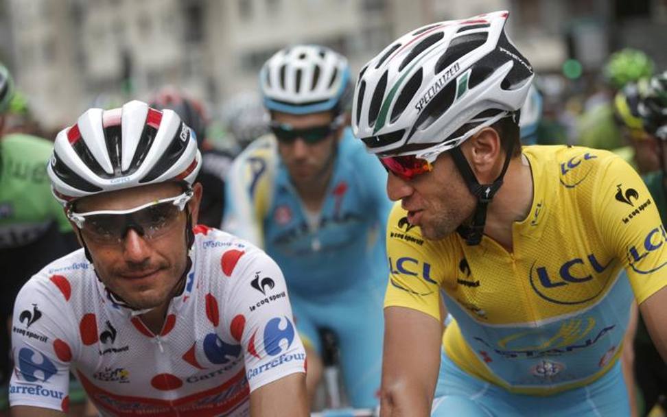 Prima della partenza della quattordicesima tappa del Tour Grenoble-Risoul, Joacquin Rodriguez e Vincenzo Nibali. Reuters